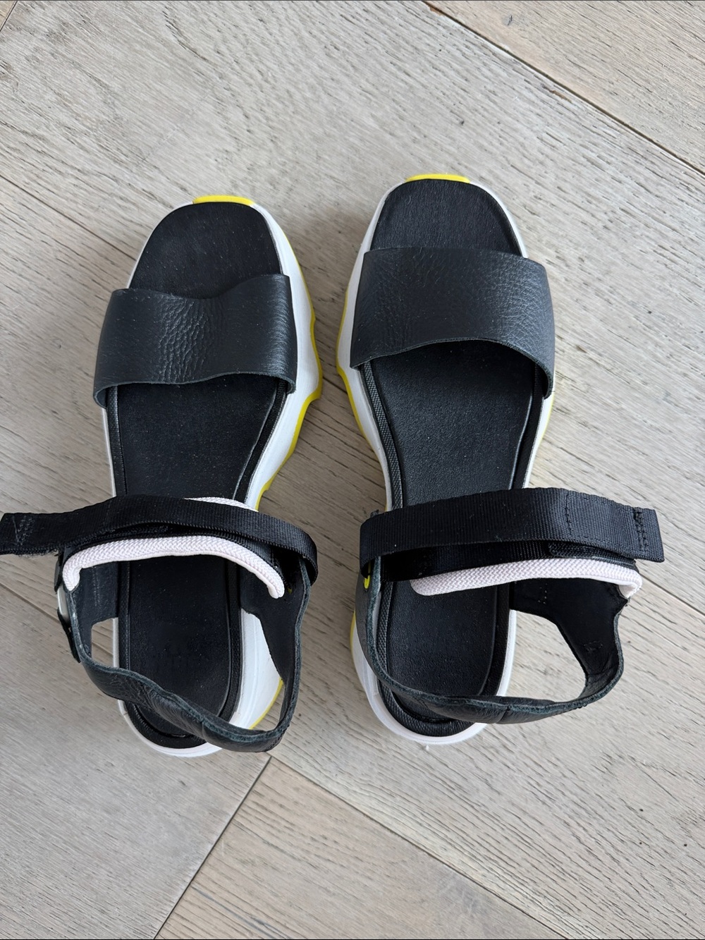 Sorel Black and White Sporty Slide Sandals with Yellow Accents